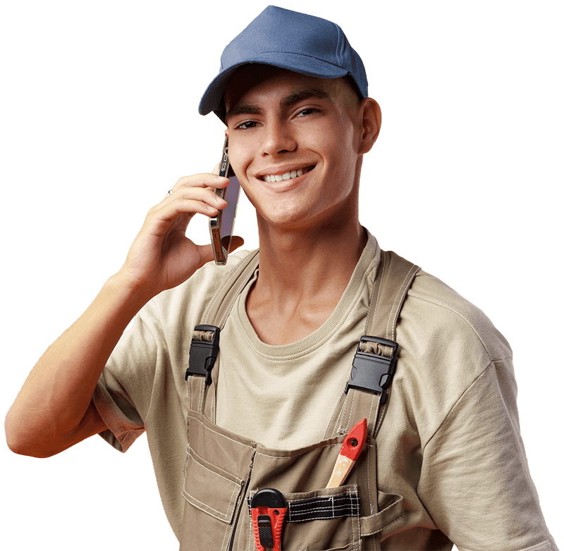 young builder talking on a mobile phone