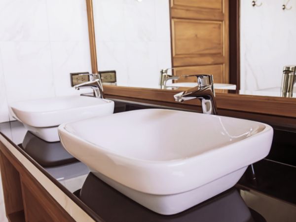 White Luxury wash basin with a tap