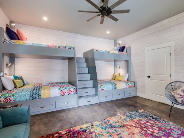 Two blue bunk bed with stairs